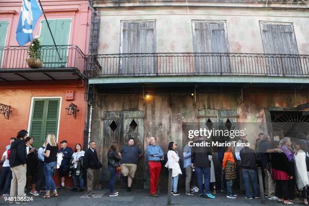 People line up to see a jazz show at Preservation Hall in the historic French Quarter, the first neighborhood of the city, on April 16, 2018 in New...