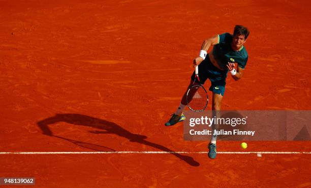 Aljaz Bedene of Slovenia watches his serve during his Mens Singles match against Rafael Nadal of Spain at Monte-Carlo Sporting Club on April 18, 2018...
