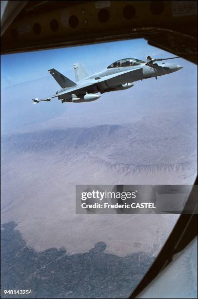 The U.S. Marines' F-18 Hornets in Afghan Air Space. During the tricky four to seven hour long missions, the American F/A-18D Hornet fighter jets are...