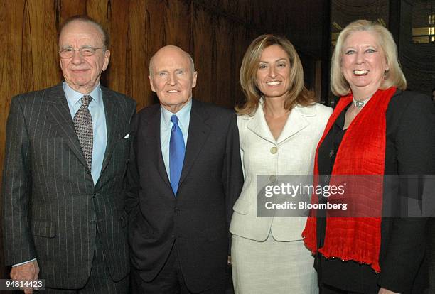 News Corp. Chairman Rupert Murdoch, left, Jack Welch, former chief executive of General Electric Co., his wife Suzy and Harper Collins chief...