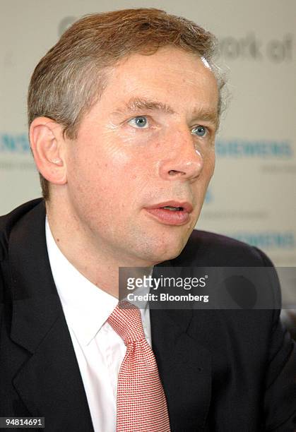 Siemens Chief Executive Klaus Kleinfeld listens at a press conference in Lisbon, Portugal, Wednesday, April 27, 2005. Siemens AG, Germany's largest...