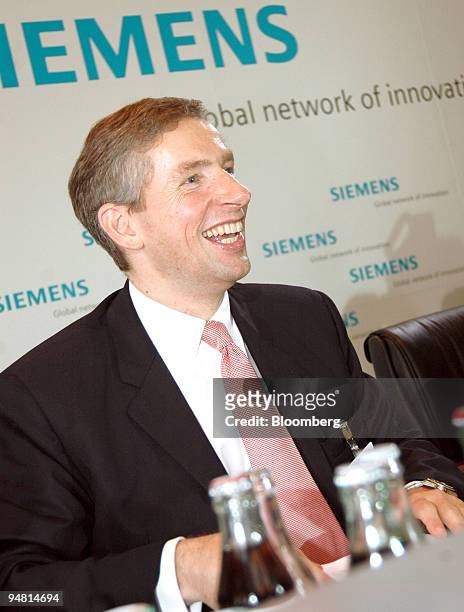 Siemens Chief Executive Klaus Kleinfeld reacts at a press conference in Lisbon, Portugal, Wednesday, April 27, 2005. Siemens AG, Germany's largest...