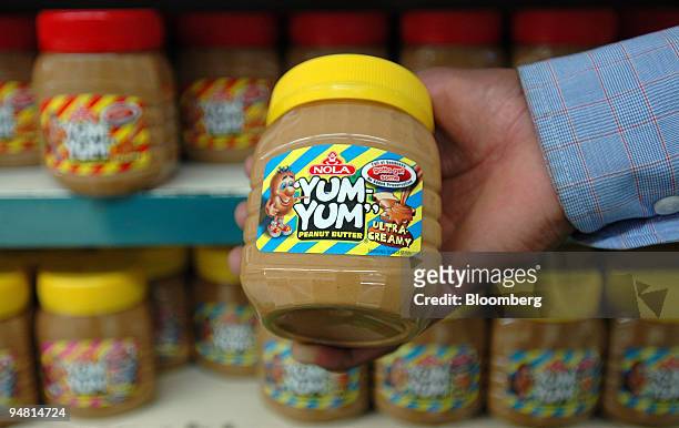 Yum Yum peanut butter, produced by Johannesburg -based Foodcorp Ltd., is seen on display at a supermarket shelf Johannesburg, South Africa, Tuesday,...