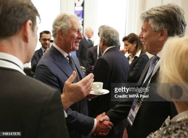 Prince Charles, Prince of Wales speaks with Ben Van Beurden, CEO of Shell, at a reception at the closing session of the Commonwealth Business Forum...