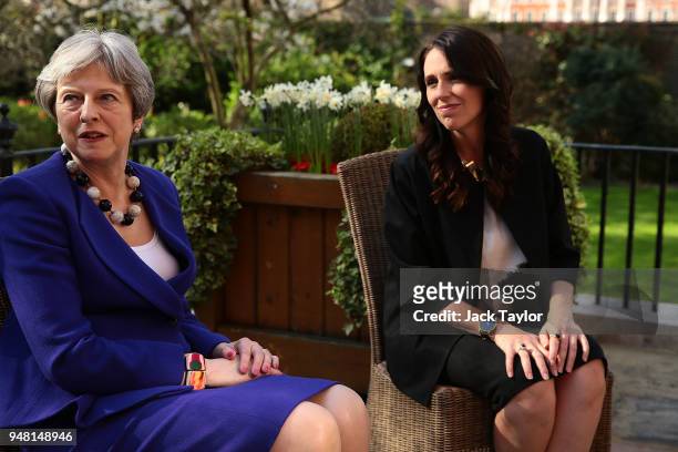 British Prime Minister Theresa May speaks with New Zealand Prime Minister Jacinda Ardern in the gardens at Downing Street on April 18, 2018 in...