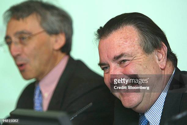 Pernod-Ricard Chief Executive Pierre Pringuet, left, and Pernod-Ricard Chief Executive Patrick Ricard speak at a press conference in Paris, France,...