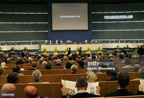 Shareholders wait for the start of the Volkswagen AG annual general meeting in Hamburg, Germany, Thursday, April 21, 2005. Pischetsrieder said profit...