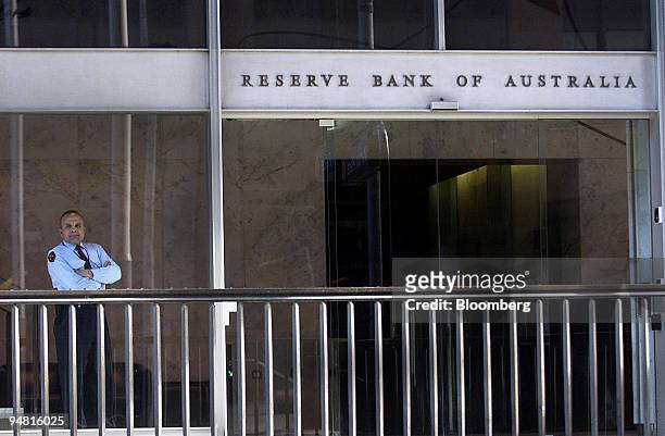 Security guard stands outside the Reserve Bank of Australia building in Sydney, Australia Tuesday, April 5, 2005. Australia's central bank...