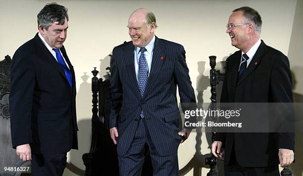 Great Britain's Finance Minister Gordon Brown, left, United States Secretary of the Treasury John Snow, center, and German Finance Minister Hans...