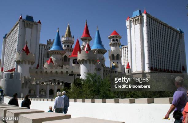 People walk by The Excalibur hotel and casino on the strip in Las Vegas, Nevada, Thursday, April 13, 2005.