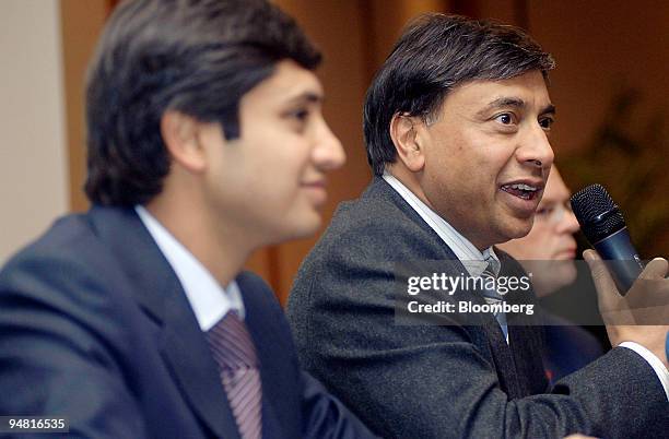 Aditya Mittal, left, group financial officer of Mittal Steel Co. And Lakshmi Mittal, chairman and chief executive officer are seen during a press...