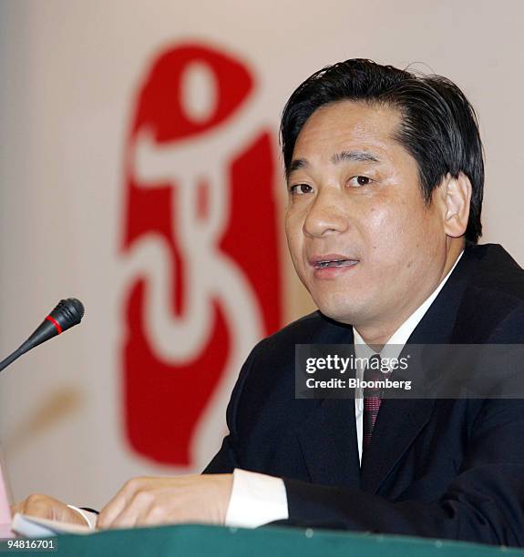 Wang Zhiyuan, Chief Economist of the Beijing 2008 Olympics, speaks at a press conference in Beijing, China, March 28, 2006. Beijing will almost...