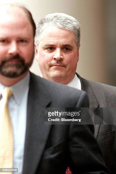 Glenn Ray, former Enron Corp. Chief Executive Officer Jeffrey Skilling's stockbroker at Charles Schwab & Co. In 2001, right, leaves the Bob Casey...