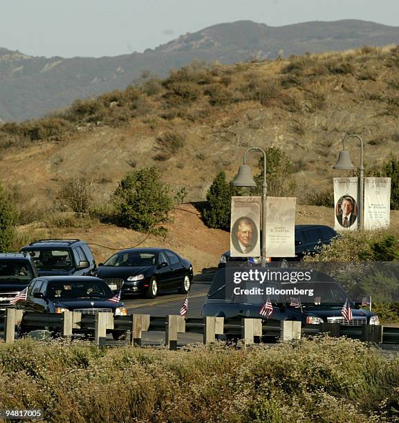 The hearse containing the casket carrying former U.S. President Ronald Reagan approaches the Ronald Reagan Library and Museum in Simi Valley,...