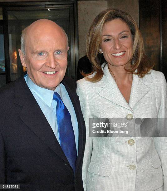 Jack Welch, former chief executive of General Electric Co. And author of the book "Winning" arrives with his wife Suzy for at a cocktail party...