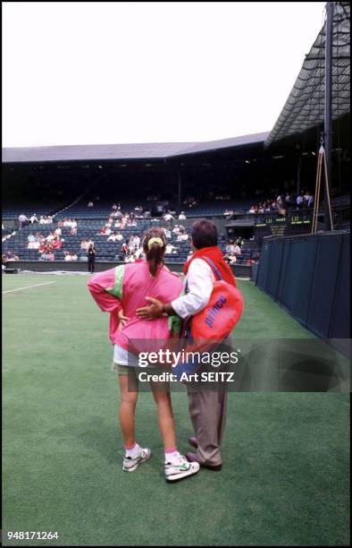 Wimbledon, UK June, 1990 Prior to the first match, Jennifer Capriati and her dad and coach Stefano Capriati take a first look at the All England Lawn...