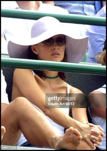 Wimbledon, uk july 4, 2001 lara feldham, girlfriend of pat rafter on court for pat's match against tomas enqvist. Rafter won 6-1, 6-3, 7-6 .