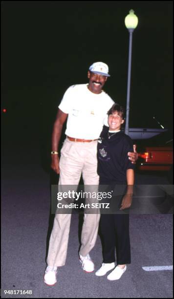 Delray Beach, Florida NBA Legend, tennis player and super fan Wilt Chamberlain with Jennifer Capriati in 1990-this photo was published in Sports...