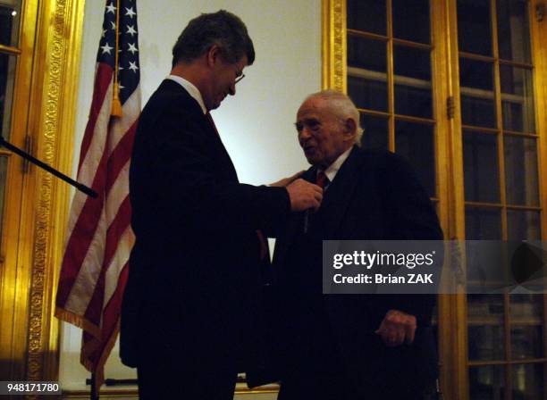 Norman Mailer presented with the medal of Chevalier of the Legion of Honor at the French Embassy, New York City BRIAN ZAK.