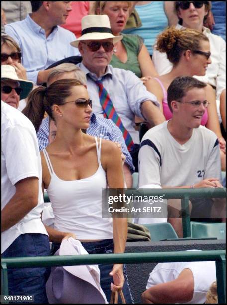 Wimbledon, uk july 4, 2001 lara feldham, girlfriend of pat rafter on court for pat's match against tomas enqvist. Rafter won 6-1, 6-3, 7-6 .