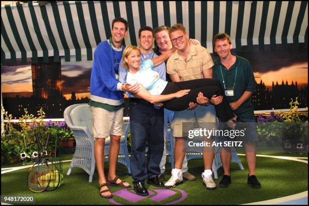 Wimbledon, uk july 5, 2001 chris evert and her nbc-tv-sports production crew in the nbc studios, wimbledon broadcast facility.