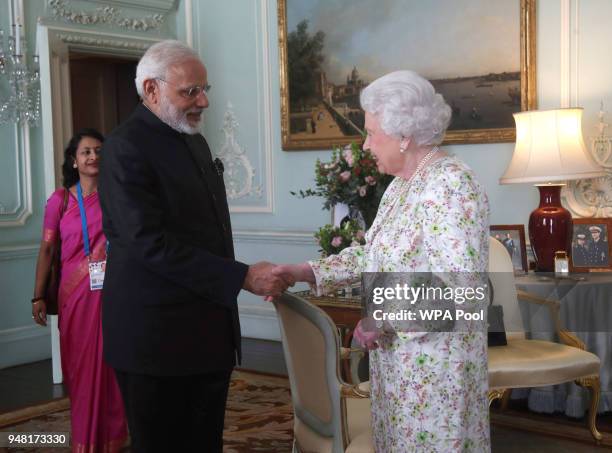 Prime Minster of India Narendra Modi is greeted by Queen Elizabeth II during a private audience at Buckingham Palace on April 16, 2018 in London,...