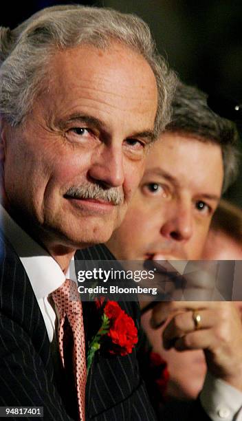 Hudson's Bay Co. CEO George Heller, left, and Chief Financial Officer CFO Michael S. Rousseau are pictured at the company's annual meeting in...