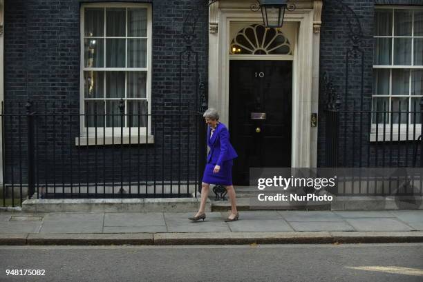 British Prime Minister Theresa May leaves Number 10 Downing Street to greet the Canadian Prime Minister Justin Trudeau ahead of a bilateral meeting...