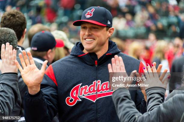 Matt Belisle of the Cleveland Indians greets fans during player introductions as part of the home opener ceremonies prior to the game against the...