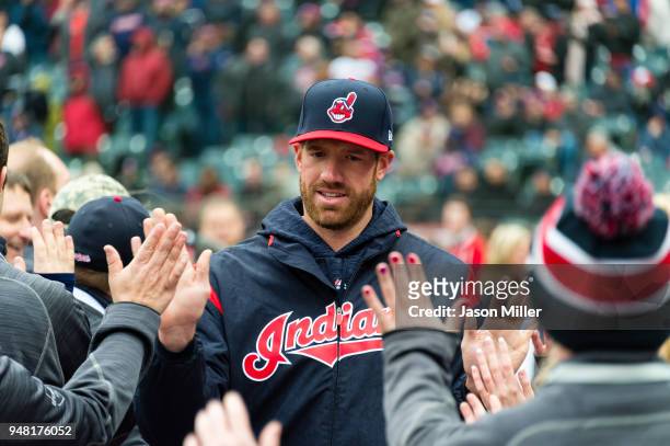 Zach McAllister of the Cleveland Indians greets fans during player introductions as part of the home opener ceremonies prior to the game against the...