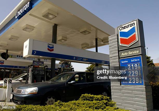 Gas prices are seen at a Berkeley, California Chevron station April 30, 2004. ChevronTexaco Corp., the second-biggest U.S. Oil producer, said...
