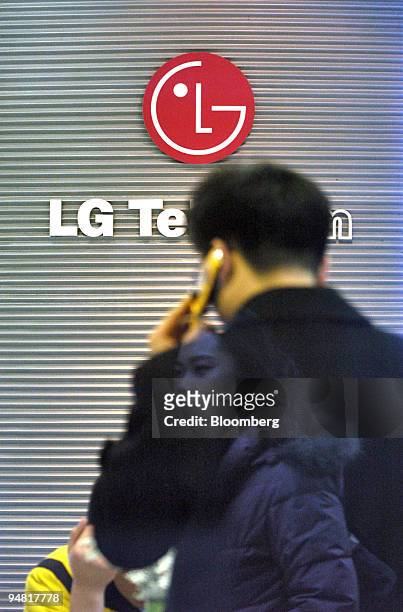 Customer waits for service at an LG Telecom business center in Seoul, South Korea Tuesday, January 24, 2006. LG Telecom Ltd., South Korea's...