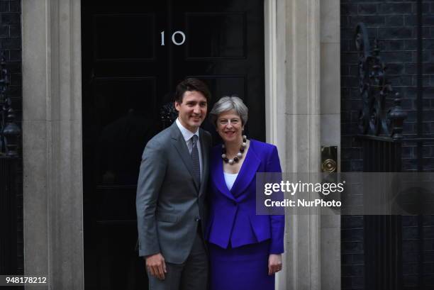 British Prime Minister Theresa May greets Canadian Prime Minister Justin Trudeau at Downing Street, as sidelines of Commonwealth Head Of Government...