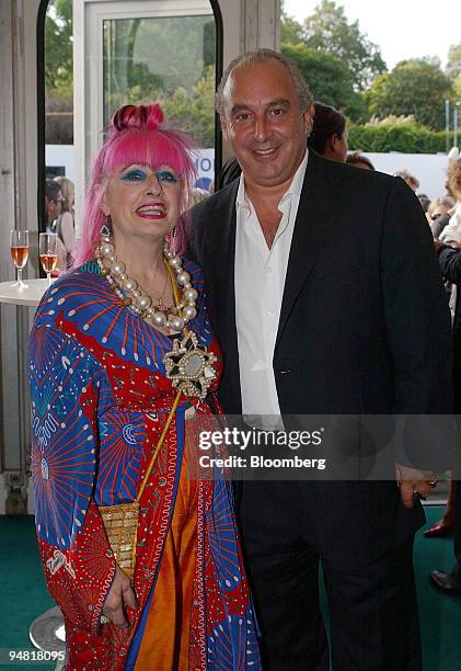 Billionaire investor Philip Green, right, poses with designer Zandra Rhodes before the Graduate Fashion Awards in London, Thursday June 10, 2004....