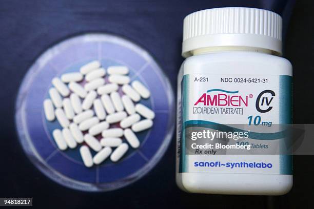 Pills of Sanofi-Aventis SA's Ambien, the top-selling insomnia drug in the U.S., are arranged in a Cambridge, Massachusetts pharmacy Wednesday, March...