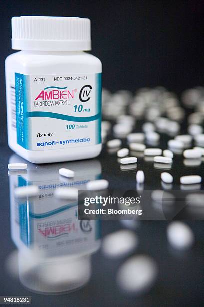 Pills of Sanofi-Aventis SA's Ambien, the top-selling insomnia drug in the U.S., are arranged in a Cambridge, Massachusetts pharmacy Wednesday, March...