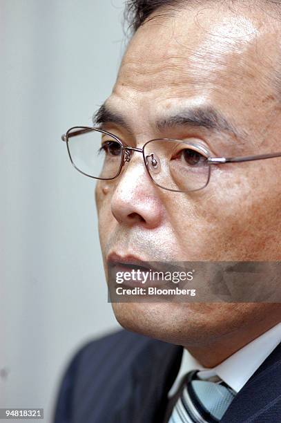 Aeon Co. President Motoya Okada speaks to reporters about his company's earnings results at the Tokyo Stock Exchange Wednesday, April 6, 2005 in...