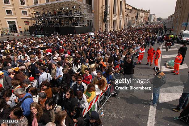 Some of the tens of thousands of pilgrims and mourners queuing to pay their respects to Pope John Paul ll lying in state in Rome, Italy, Tuesday,...