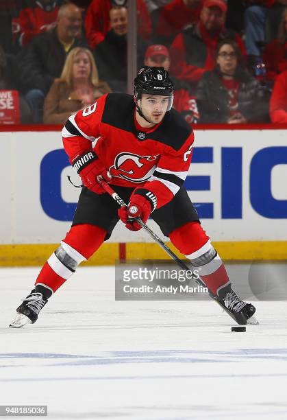 Will Butcher of the New Jersey Devils plays the puck in Game Three of the Eastern Conference First Round against the Tampa Bay Lightning during the...