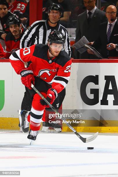Blake Coleman of the New Jersey Devils plays the puck in Game Three of the Eastern Conference First Round against the Tampa Bay Lightning during the...