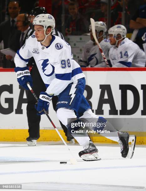 Mikhail Sergachev of the Tampa Bay Lightning plays the puck in Game Three of the Eastern Conference First Round against the New Jersey Devils during...