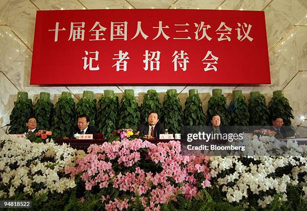 As part of the National People's Congress, Chinese officials give a press conference Monday, March 7, 2005 about economic and social development and...