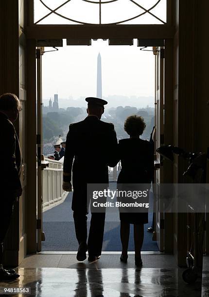 Former First Lady Nancy Reagan, right, wife of Former President Ronald Wilson Reagan, is escorted by Maj. Gen. Galan Jackman, Commander of the...