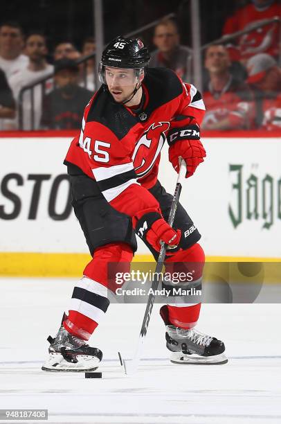 Sami Vatanen of the New Jersey Devils plays the puck in Game Three of the Eastern Conference First Round against the Tampa Bay Lightning during the...