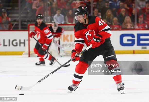 Sami Vatanen of the New Jersey Devils plays the puck in Game Three of the Eastern Conference First Round against the Tampa Bay Lightning during the...