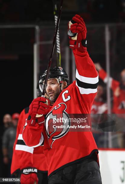 Andy Greene of the New Jersey Devils salutes the fans after defeating the Tampa Bay Lightning in Game Three of the Eastern Conference First Round...