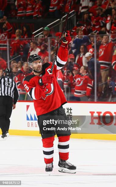 Andy Greene of the New Jersey Devils salutes the fans after defeating the Tampa Bay Lightning in Game Three of the Eastern Conference First Round...