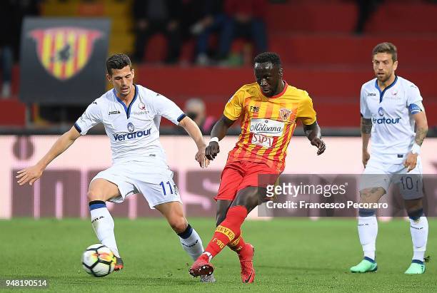 Bacary Sagna of Benevento Calcio vies with Remo Freuler of Atalanta BC during the serie A match between Benevento Calcio and Atalanta BC at Stadio...