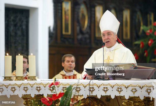 Holy mass is held by Jozef Kowalczyk at the Holy Cross Church in Warsaw, Poland, Sunday, April 3, 2005. Thousands of Roman Catholics, some gripping...