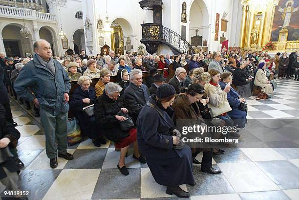 Holy mass is held at the Holy Cross Church in Warsaw, Poland, Sunday, April 3, 2005. Thousands of Roman Catholics, some gripping rosary beads and...